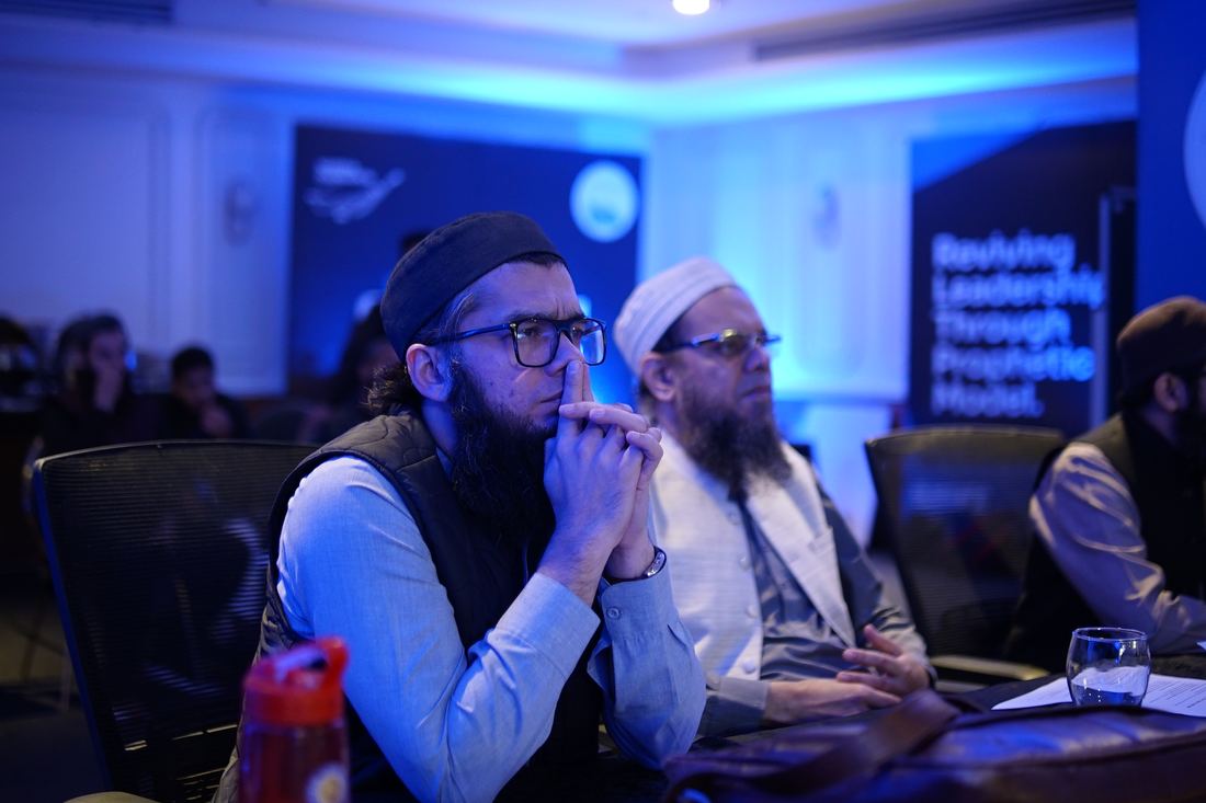 Two participants listening.